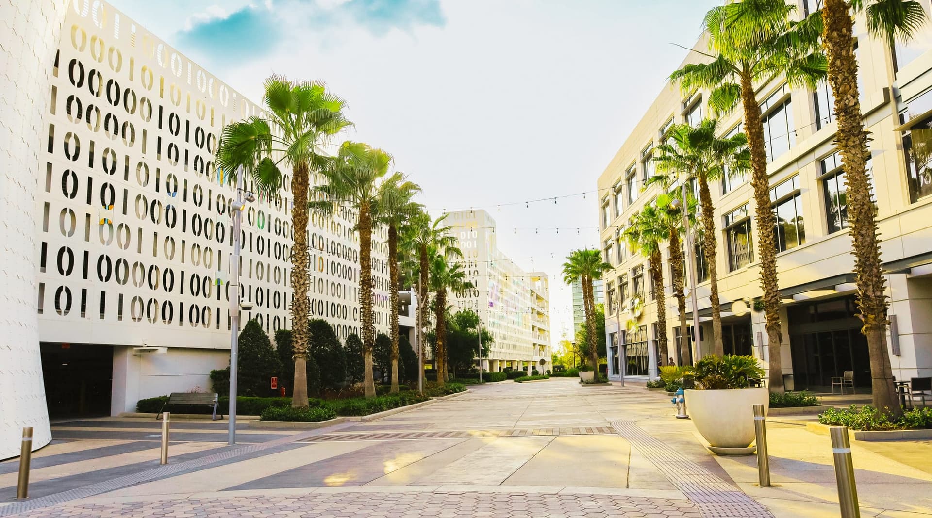 Palm-lined plaza and town-center buildings in Lake Nona